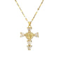 Paved cubic zirconia cross pendant necklace laid flat on a light background