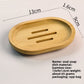 Oval bamboo soap dish with three slots, 13 x 9 x 1.6 cm, about 65 g, on a light surface