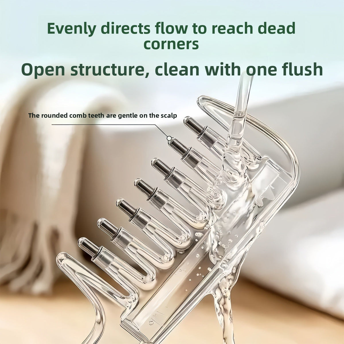 Close-up of liquid flowing through the clear comb teeth with metal ball tips