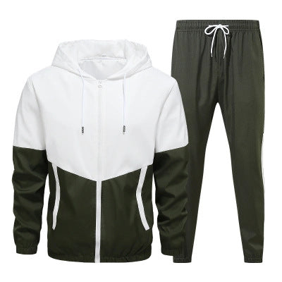 Color and tone detail of the contrast color-block panels on the tracksuit jacket