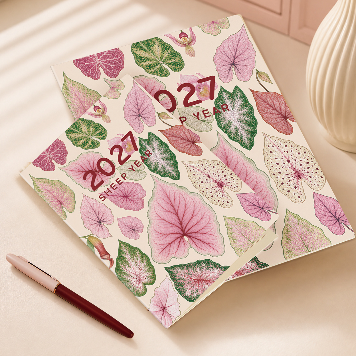 Monthly planner notebook shown open with a monthly grid and lined pages