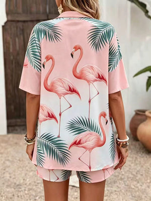 Front view of the women's flamingo print cardigan and shorts set worn over a white crop top