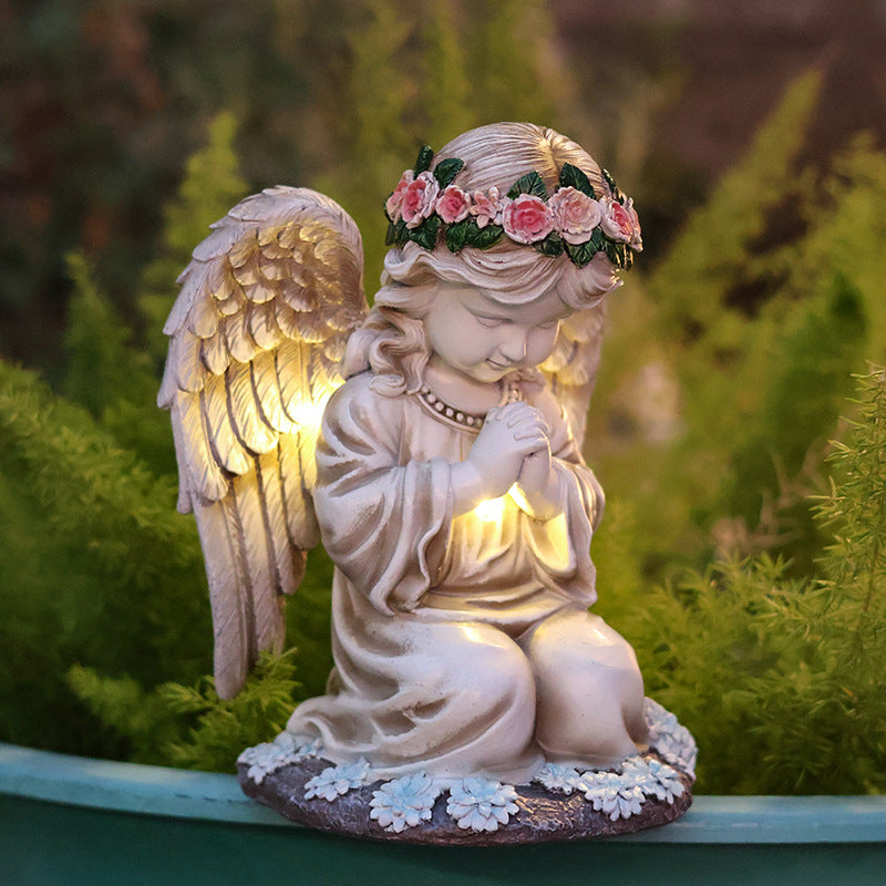 Kneeling praying angel garden statue with rose crown and glowing wings, Praying angel option