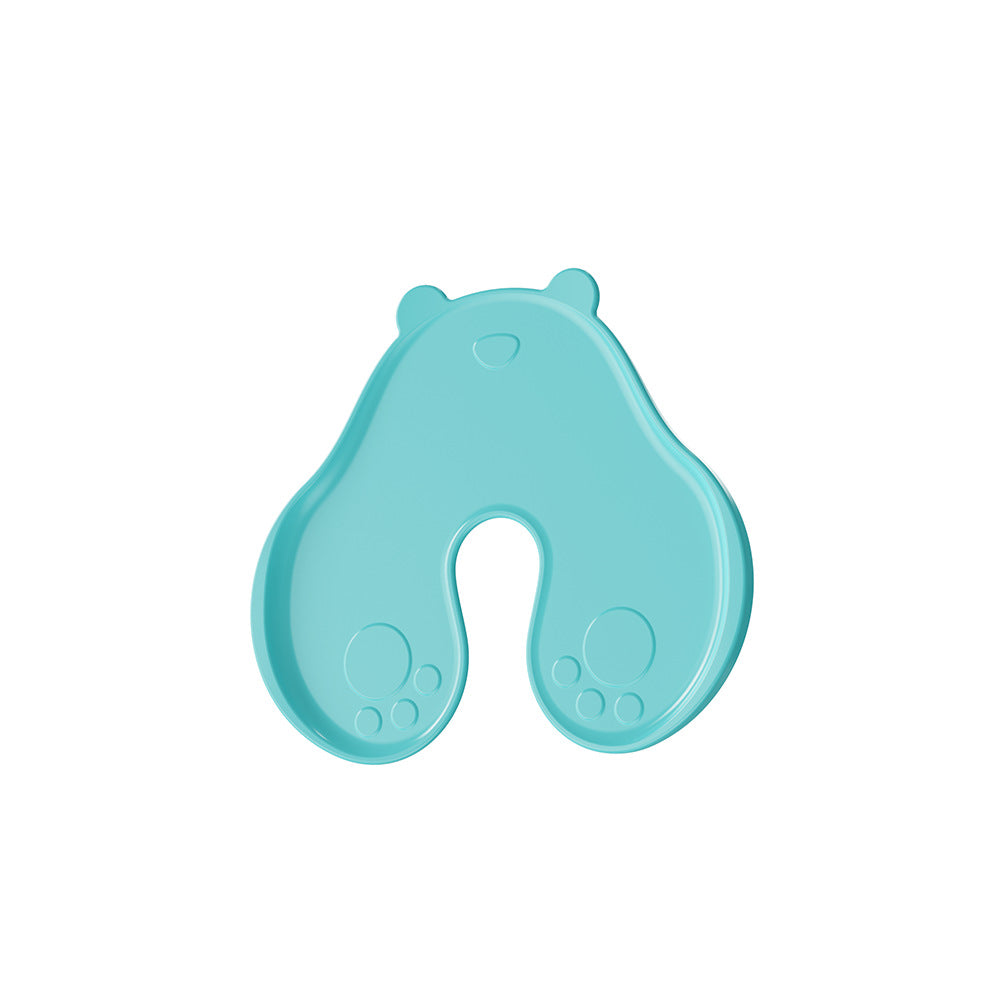 Single mint green bear shaped skin pad with molded ears, paw prints, and an open central notch