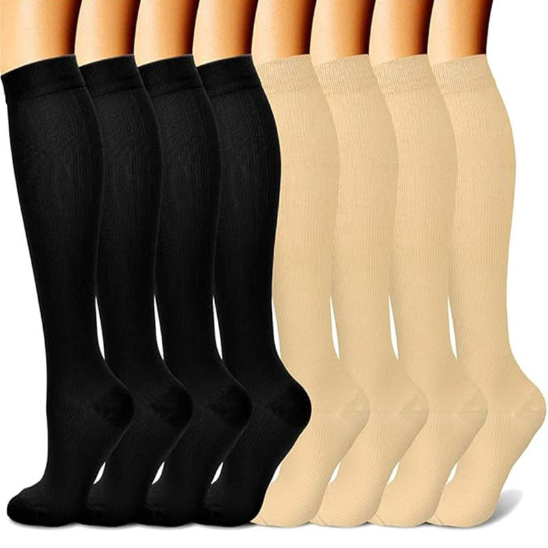 Compression socks worn on the leg highlighting the cushioned toe and heel