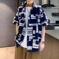 Navy blue camp shirt in the largest sizes, loose straight body over wide trousers