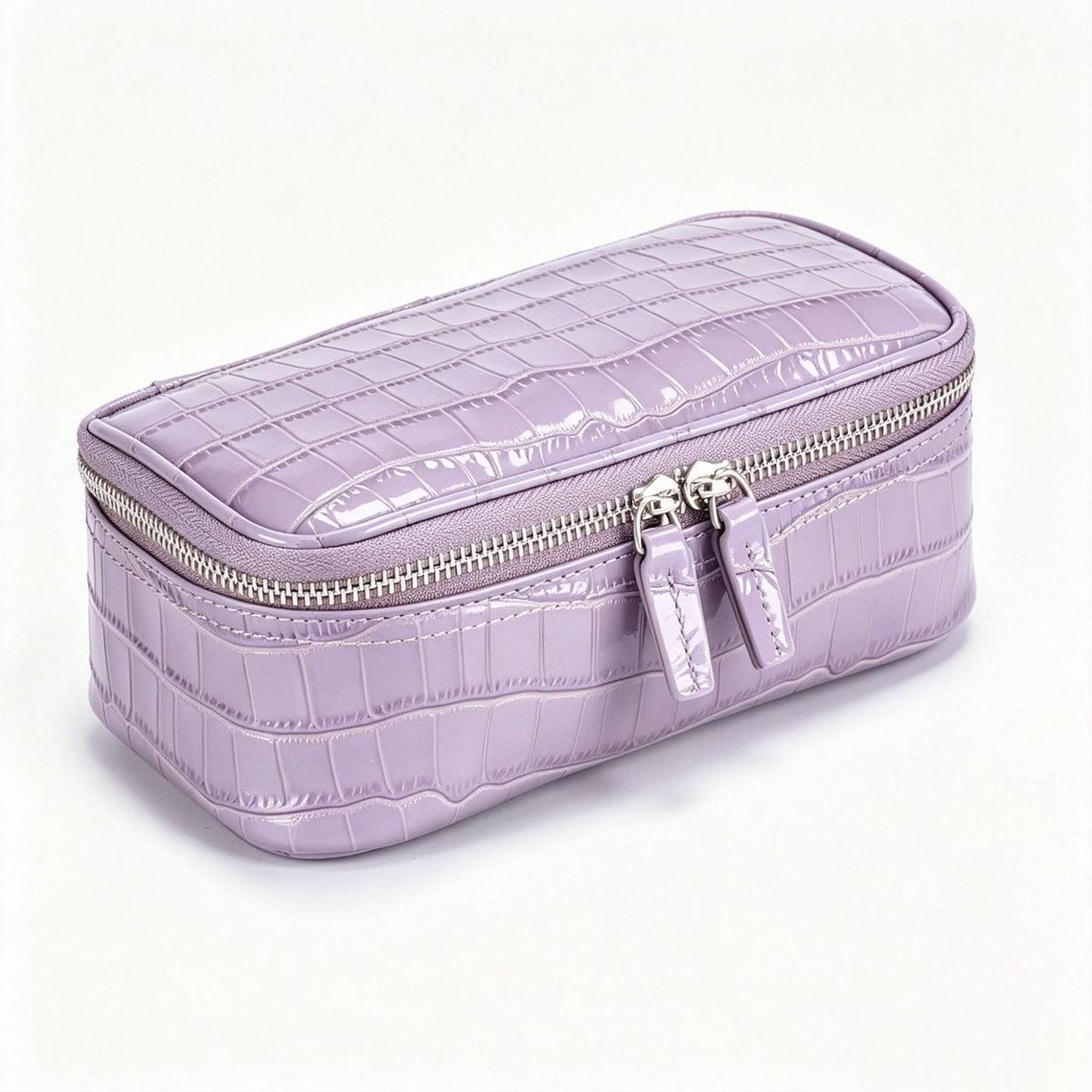 Light purple crocodile pattern genuine leather cosmetic bag with silver double zipper, three quarter view