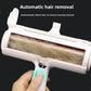 Reusable pet hair remover roller open head showing collected fur in the chamber