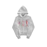 Close up of the graffiti print on the white hoodie fabric