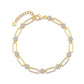 Bracelet worn against a coffee cup catching morning kitchen light