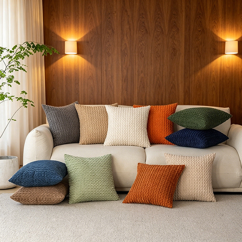 Raised popcorn texture on a plush decorative throw pillow cover