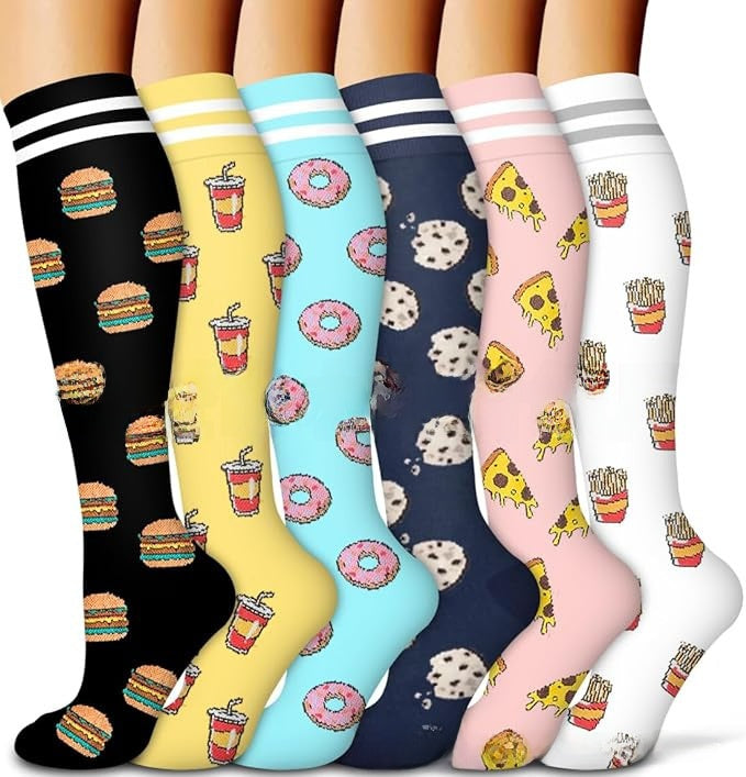 Pair of knee high compression running socks showing calf length and sole grip