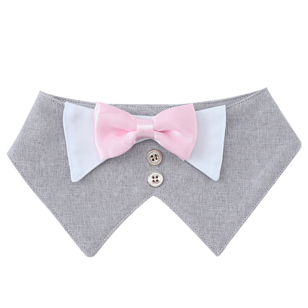 Pet bow tie vest worn by a cat or small dog for a formal photo