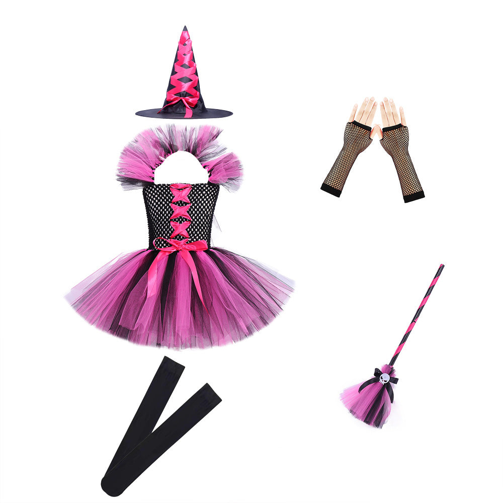 Girl adjusting her purple witch hat with both hands