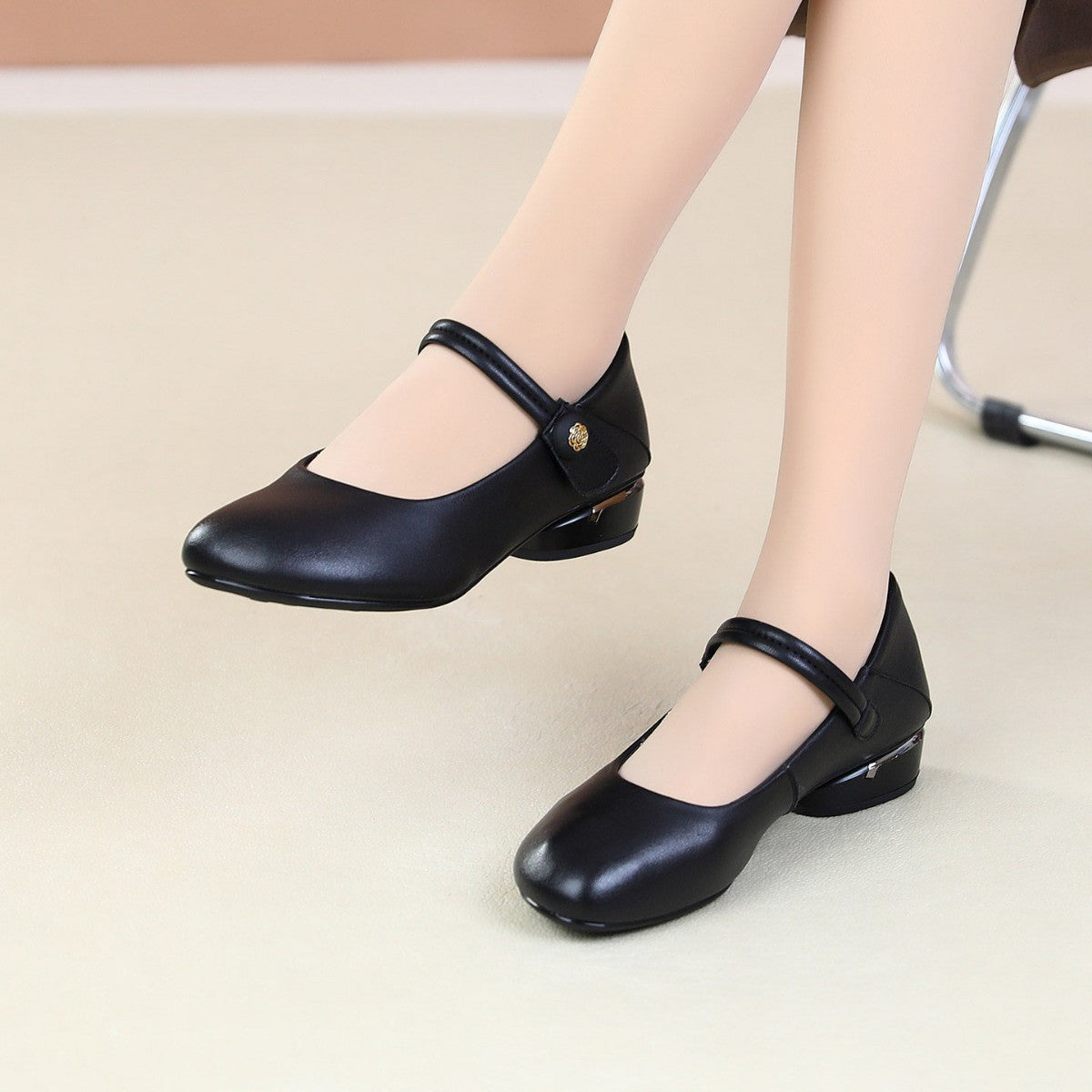 Mary Jane shoe paired with sheer tights wool dress
