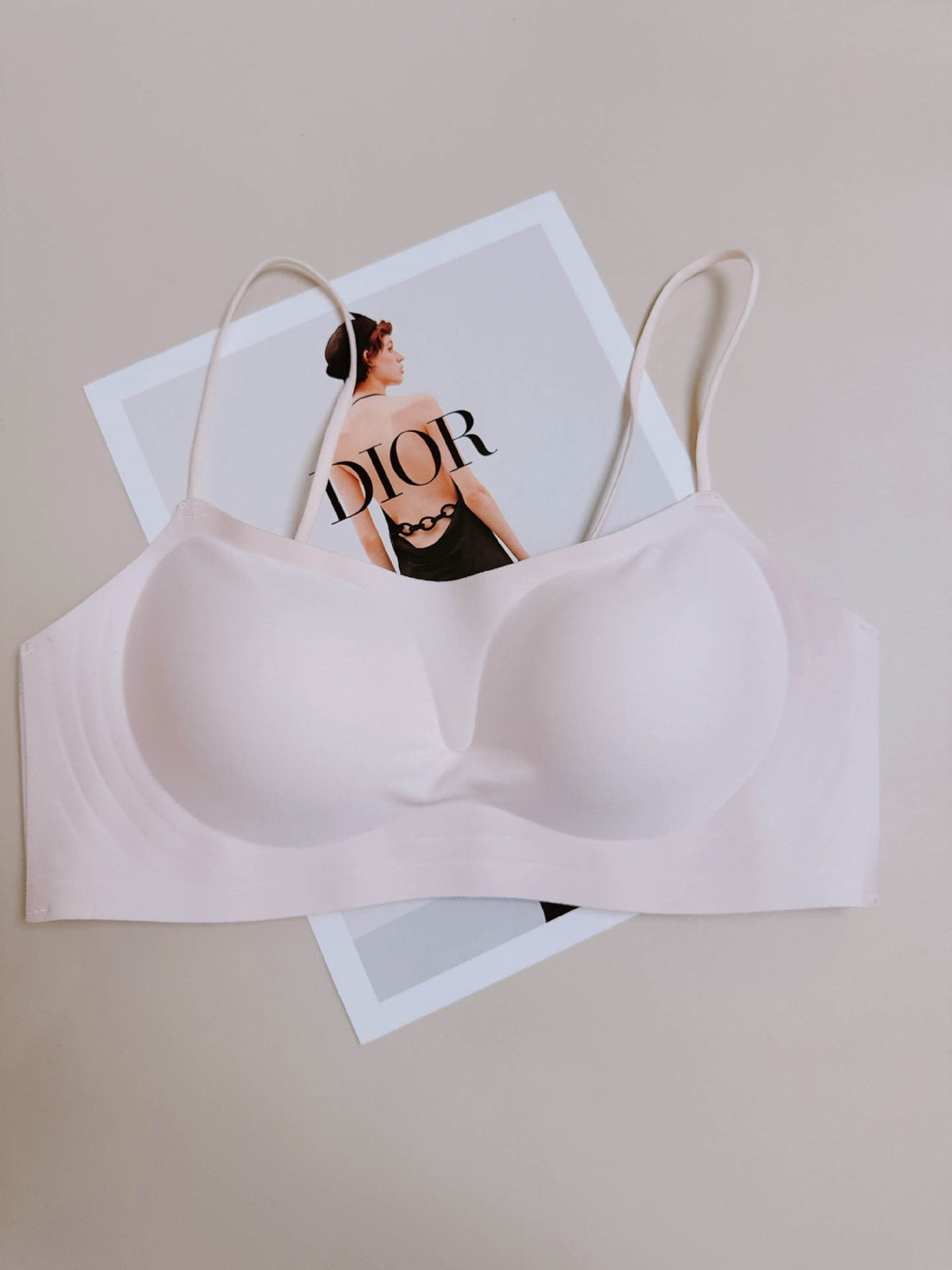 Light pink seamless wireless push up bralette with fixed molded cups and thin straps