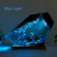Blue resin ocean night light with two divers and shipwreck wood capped edge