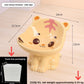 Little tiger ceramic raised pet bowl in yellow with painted stripes and round ears, 14 by 12.5 cm and 13 cm high