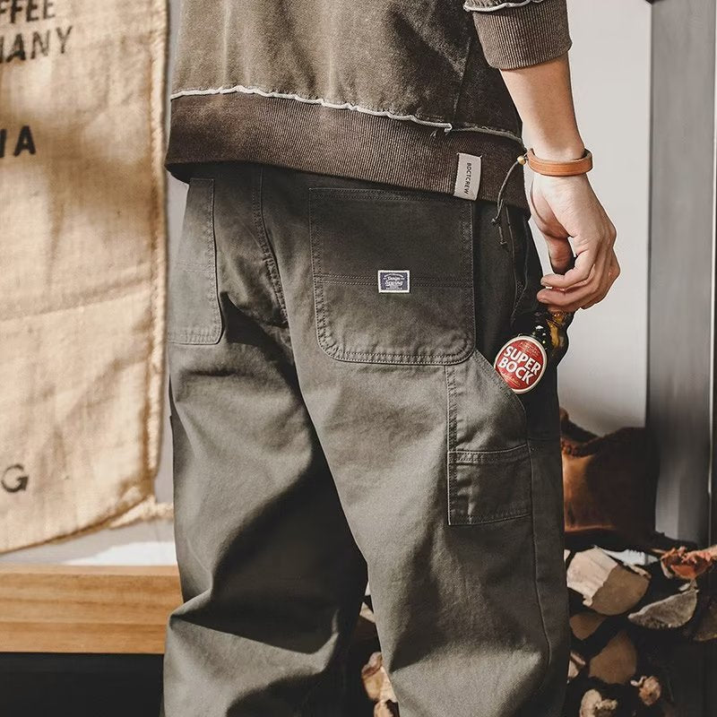 Side profile of the loose fit cargo pants showing the tapered leg and cargo pocket placement