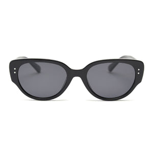 Black oval cat eye TR90 frame with dark tinted lenses shown from the front