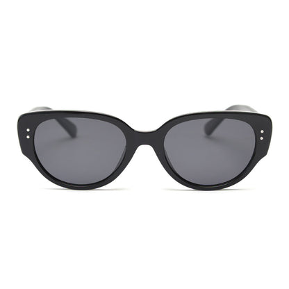 Black oval cat eye TR90 frame with dark tinted lenses shown from the front