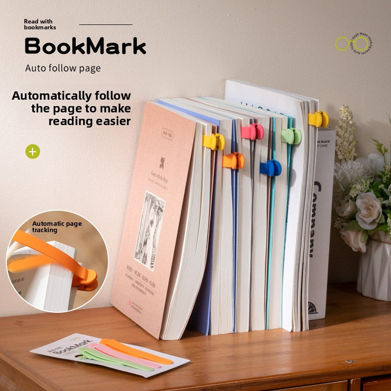 Row of open books upright on a shelf, each marked with a different colored silicone bookmark clip