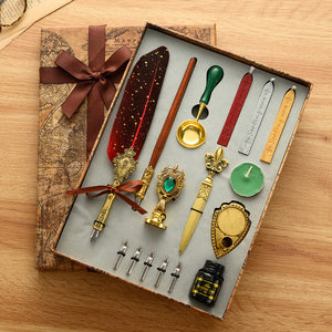 European style feather dip pen with a stainless steel nib, gold flecked resin barrel and ornate gold tone grip