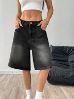 Women's denim wide-leg shorts in deep black on a clean studio background