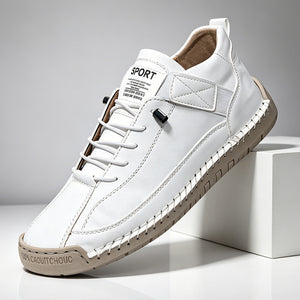 Pair of hand-stitched casual shoes with a stitched welt sole