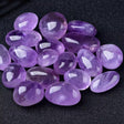 Brazilian amethyst rolling stone