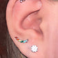 Curved marquise cubic zirconia top of a titanium piercing stud in close view