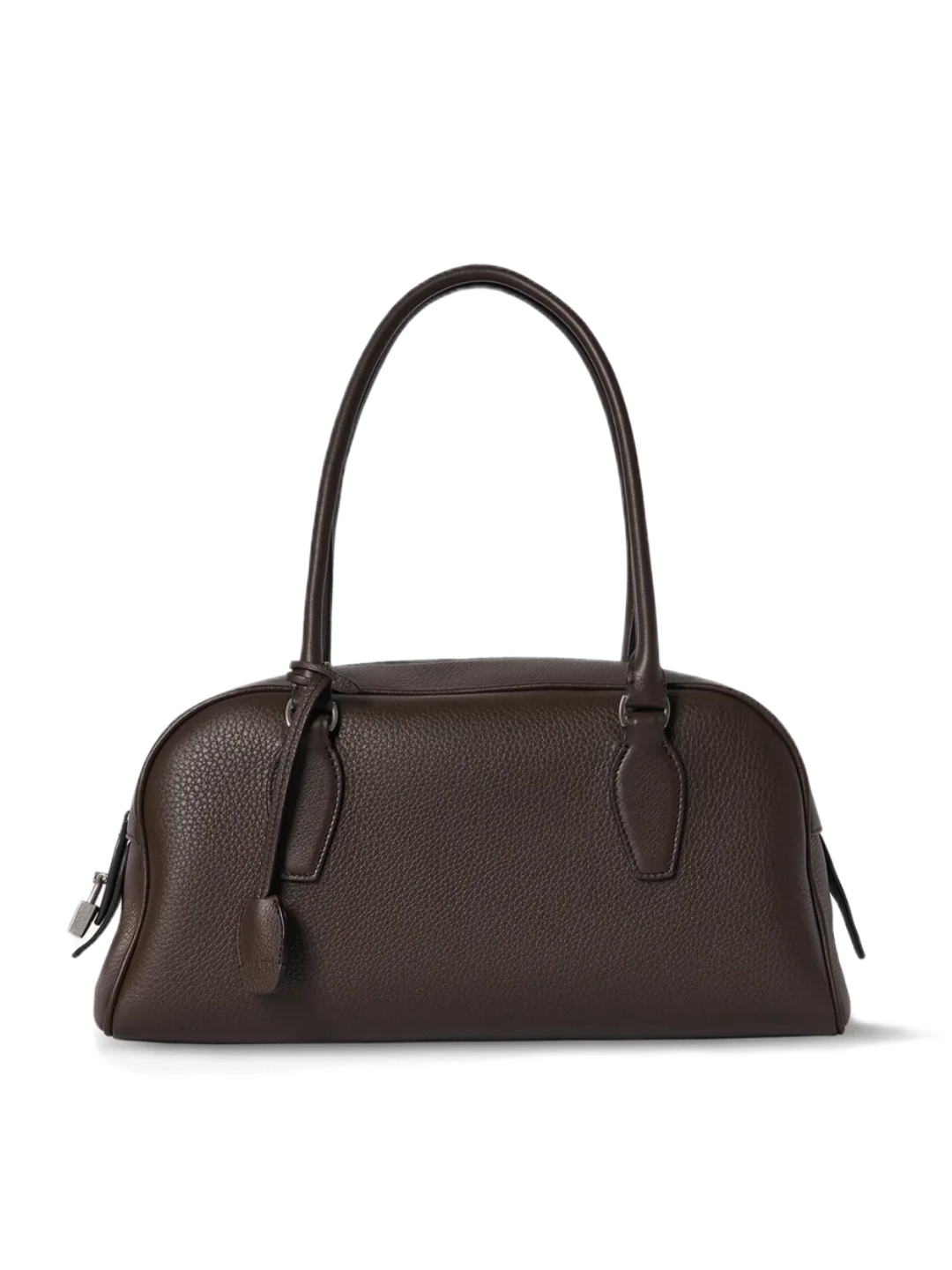 Hand holding the leather shoulder handbag for scale reference