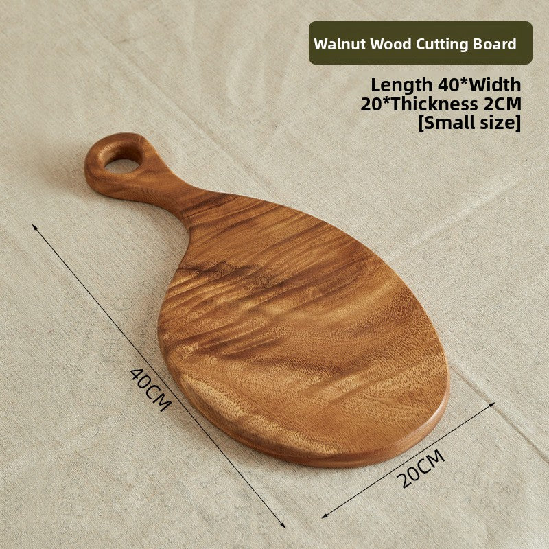 Walnut drumstick shaped serving board 45 by 25 cm shown from above