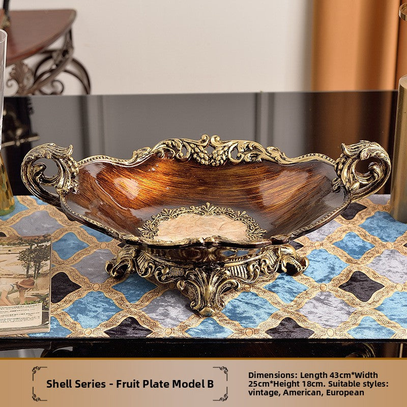 Cast resin home decor piece with vintage European molding, gold tone trim, and shell inlay surface