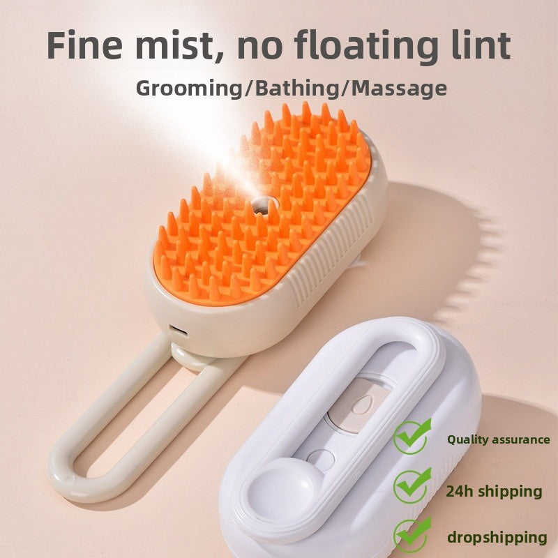 Cream pet spray brush with orange rubber bristles and a fine mist leaving the center nozzle, beside a white brush back