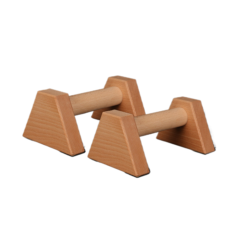 Four sided beech push up bars angled on white, black pads visible under the feet