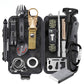 Full survival kit laid open, both foam trays filled with fire, cutting and signalling pieces