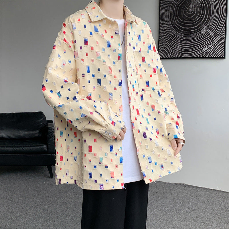 Distressed button shirt with frayed squares showing flecks of colour, loose oversized cut