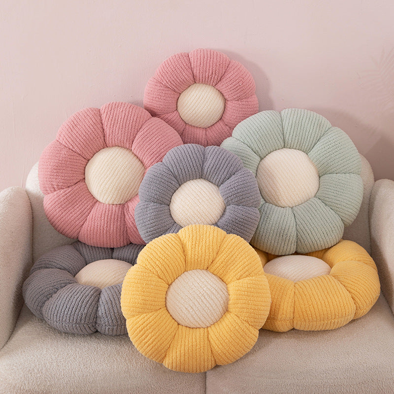 Close up of the chunky knit plush surface of the flower shaped seat cushion
