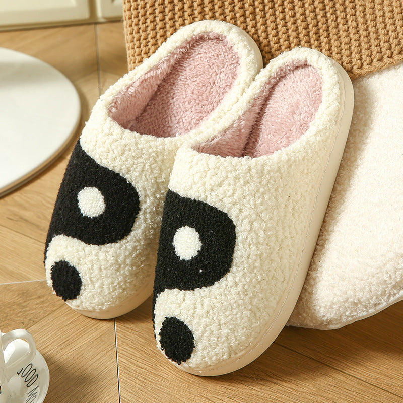 Cream plush slippers with a tufted black and white yin yang design, size 42-43 option
