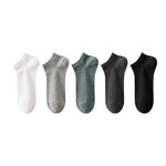 Five low cut bamboo blend ankle socks in white, grey, sage green, dark grey and black on white