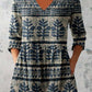 Bordered boho print tunic top shown on a model over slim trousers