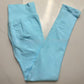 Light blue seamless leggings with the curved knitted seat panel visible on the flat lay