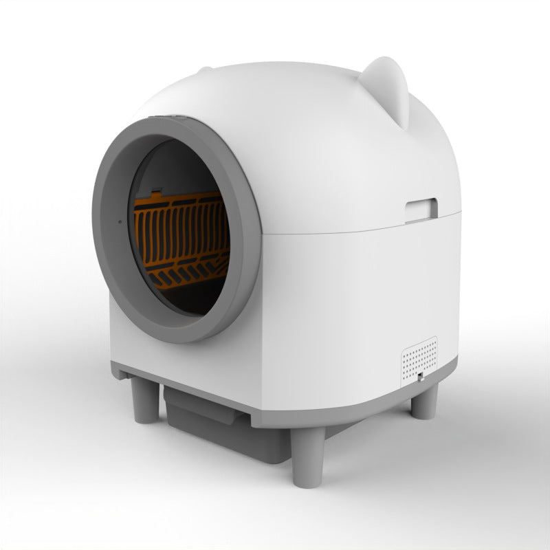 Automatic cat litter box styled in a clean home setting
