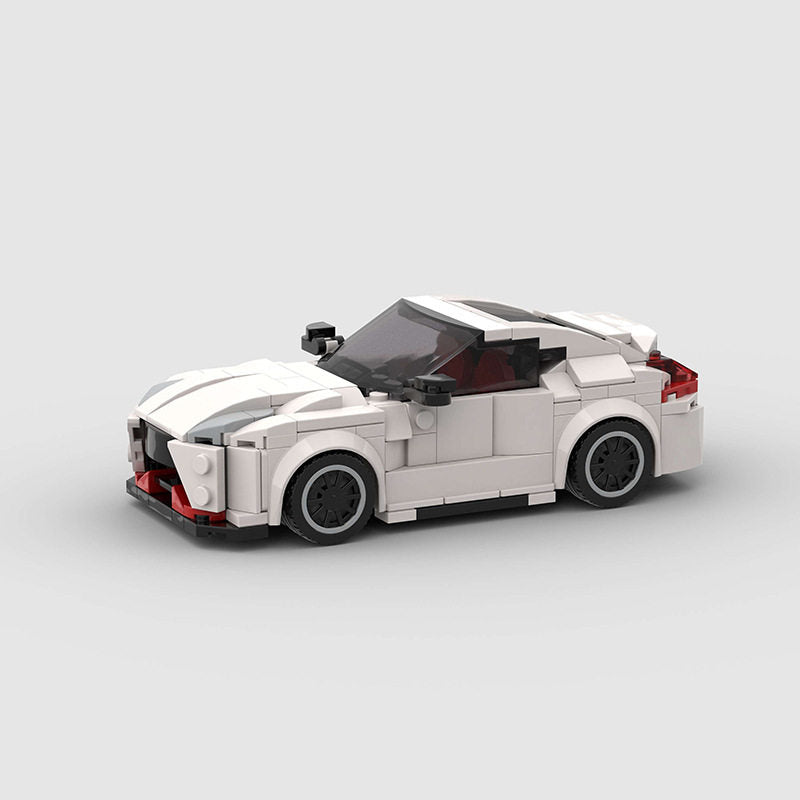 Brick-built 370Z Nismo model held to show its scale