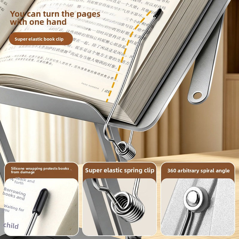 Close-up of the book stand spring clip holding open pages, with silicone tip, spring clip and rotation joint callouts