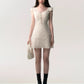 Cream white lace patchwork summer dress shown folded and ready for presentation