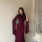 Close-up of the slim-fit dress waistline seam and fabric surface