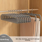 Gray pants hangers on a wardrobe rail with trousers draped over the bars, Quiet Gray