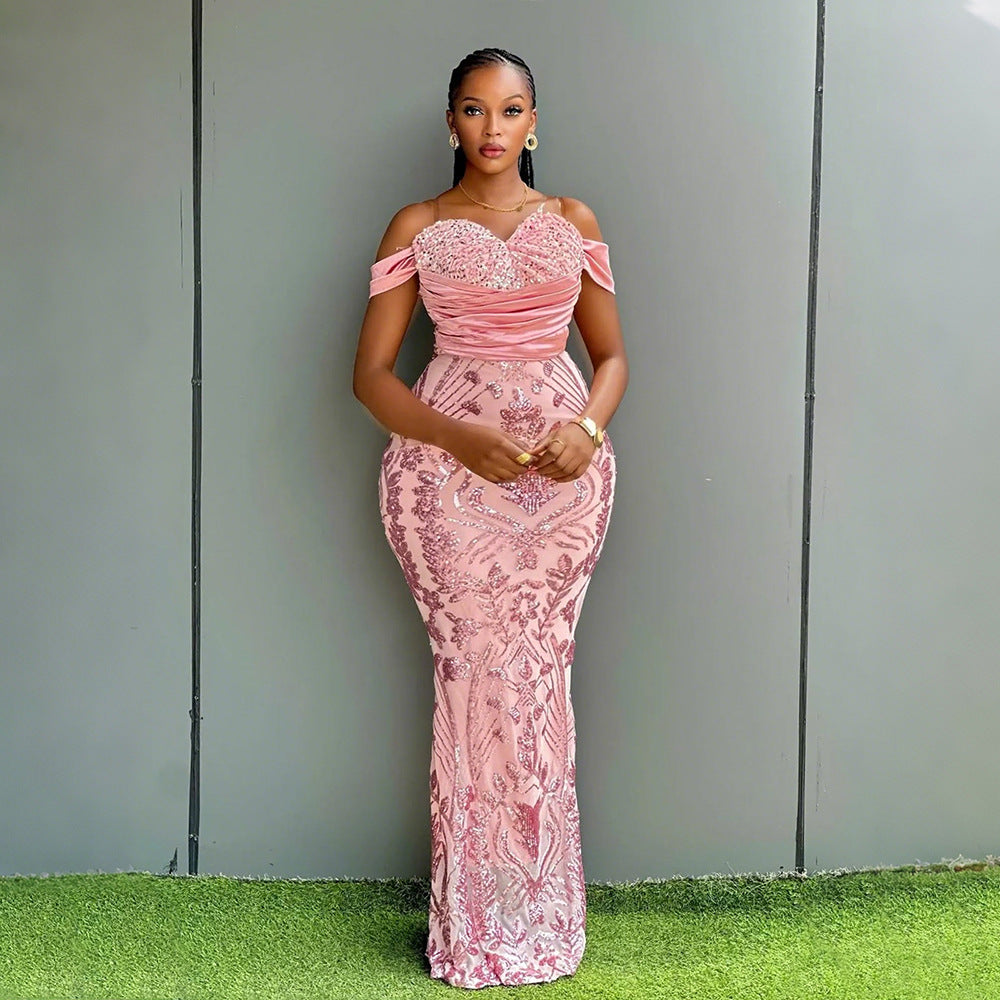 Off shoulder sweetheart bodice detail on the pink sequin evening gown